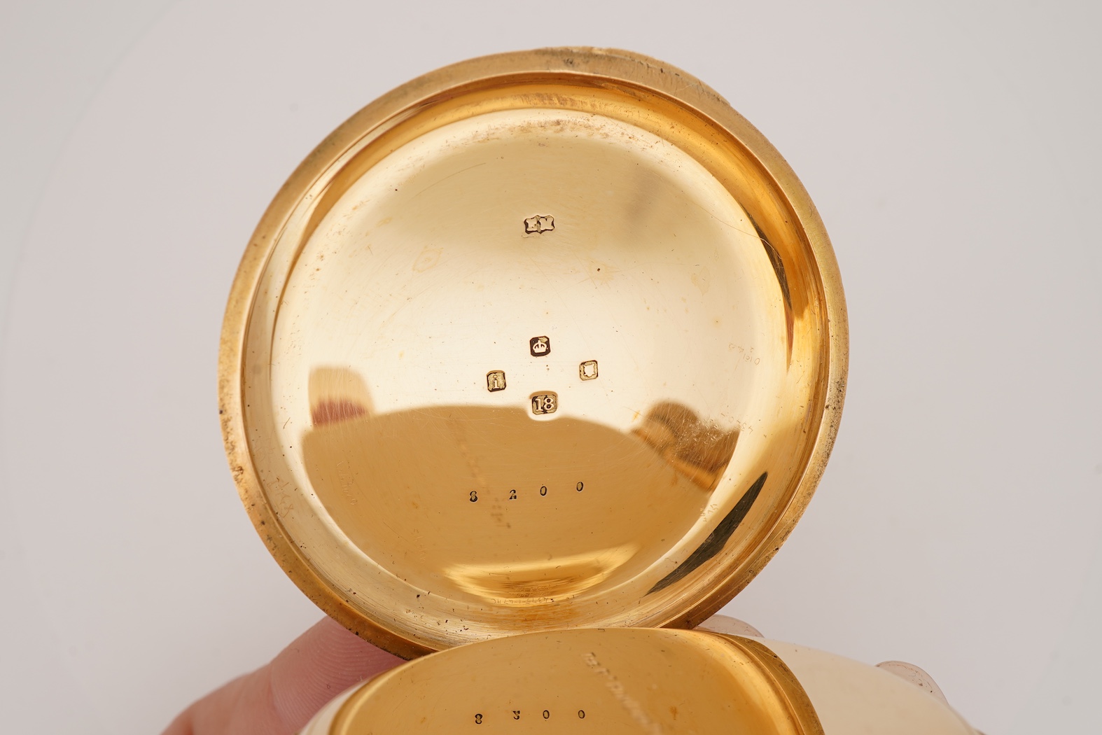 An Edwardian 18ct gold keyless lever half hunter pocket watch, by Clerke, Royal Exchange, London